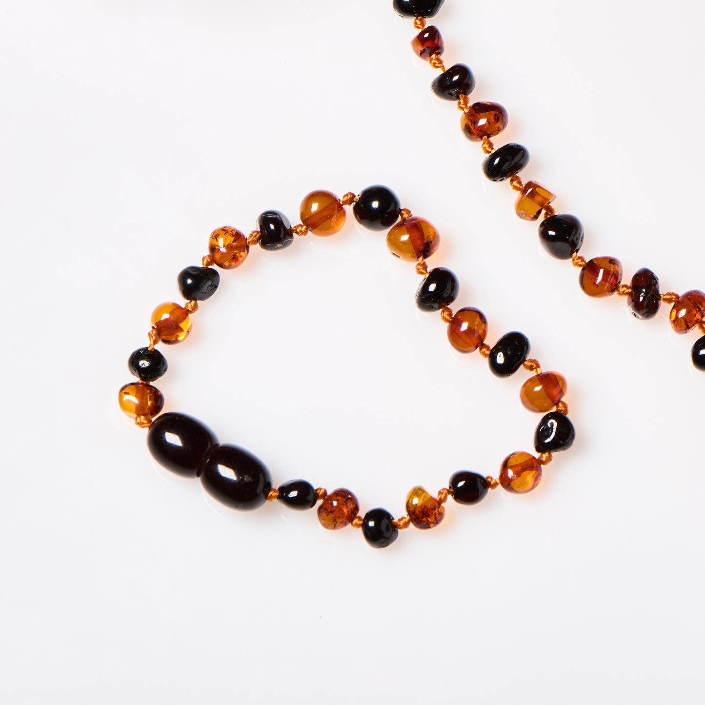 polished cherry amber and cognac children's teething bracelet