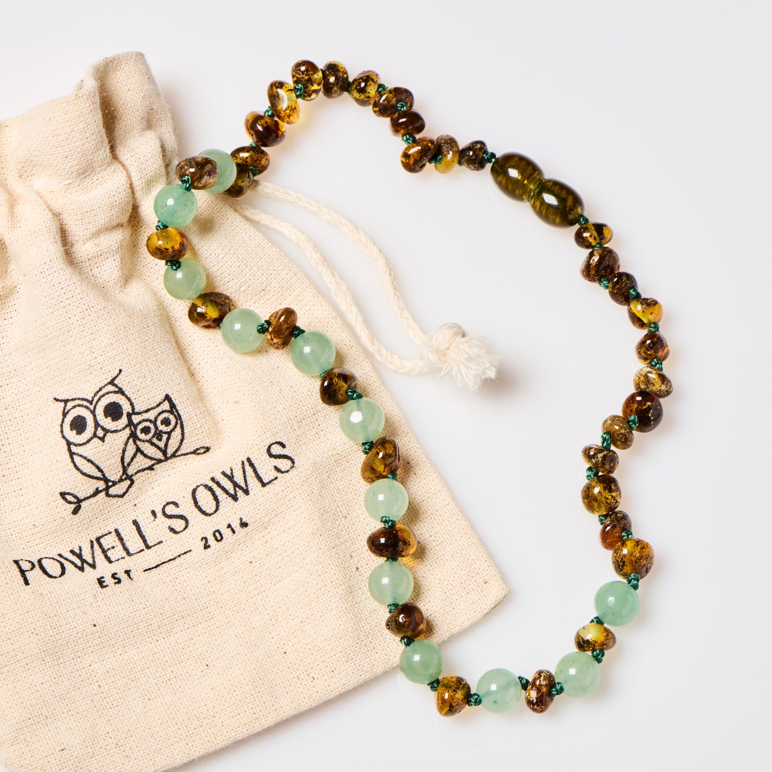 polished green amber and agate teething necklace