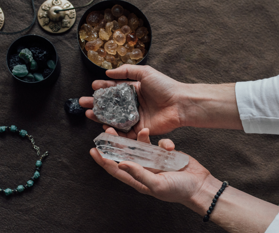 man holding crystals