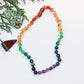 a beaded necklace with baltic amber and semiprecious gemstones for soothing anxiety and pain relief