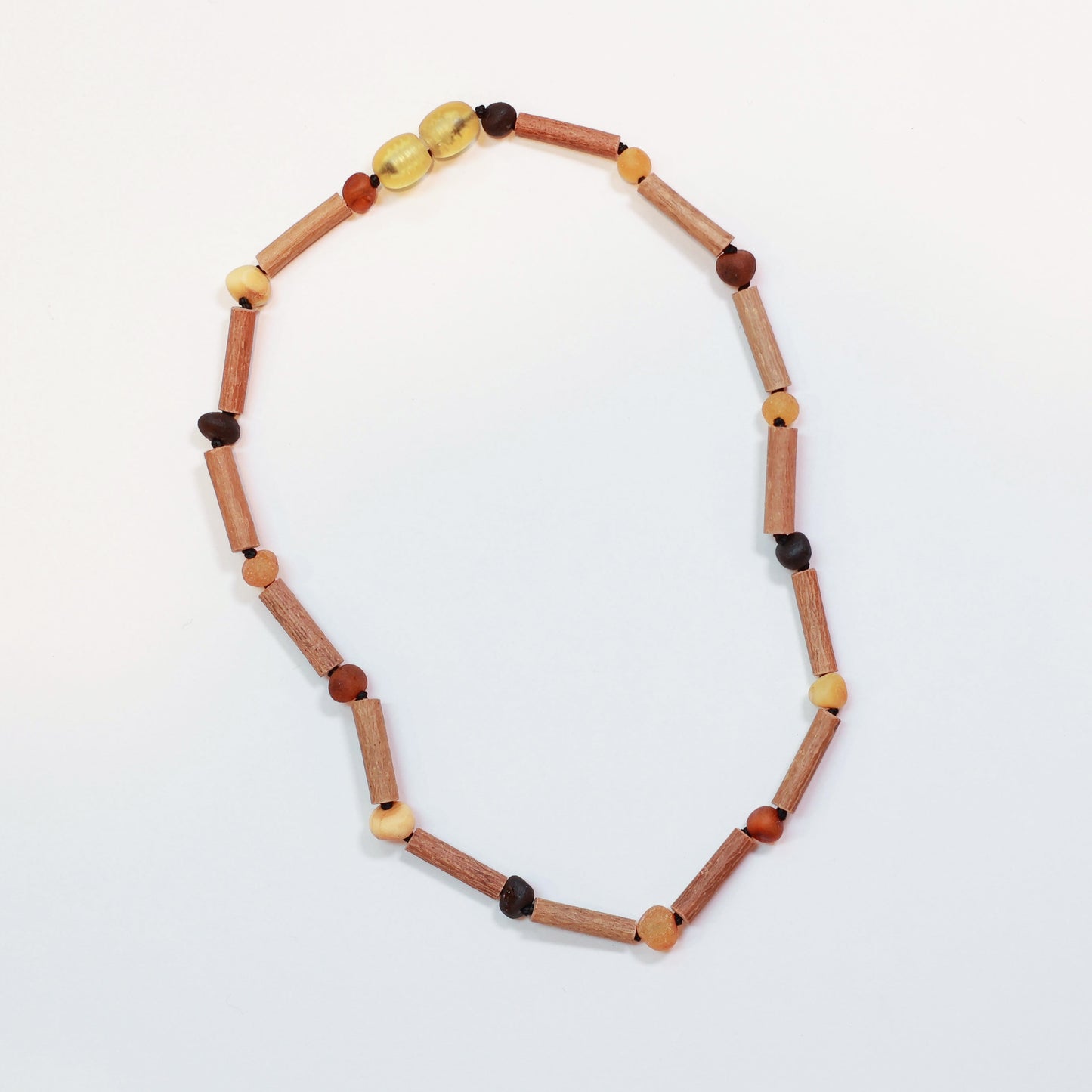 baby teething necklace with Baltic amber beads and hazelwood
