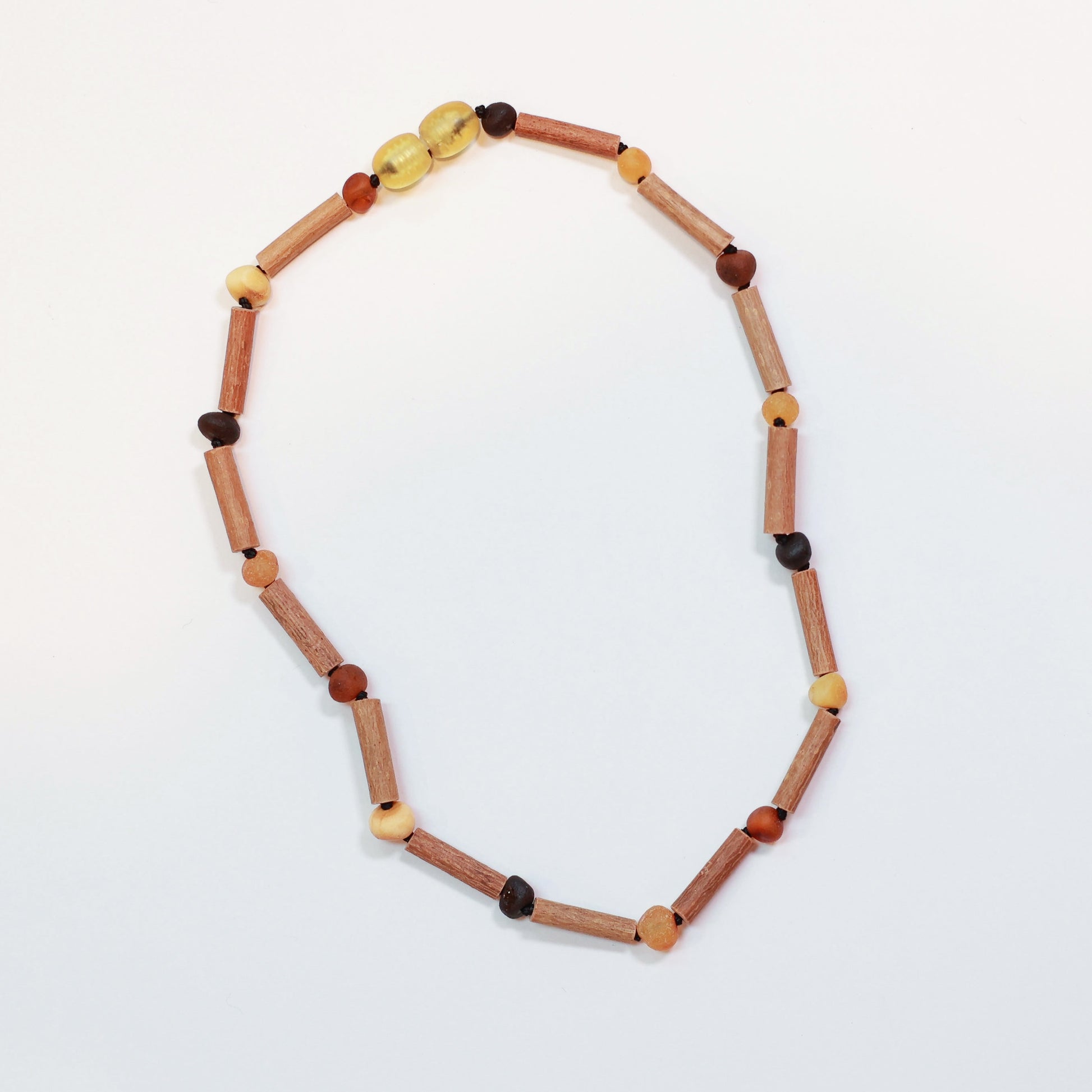 baby teething necklace with Baltic amber beads and hazelwood