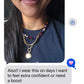 Woman wearing a colorful beaded amber and gemstones necklace layered with gold jewelry, text overlay about confidence and boost