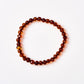 polished cognac Baltic amber beaded bracelet in an adult size