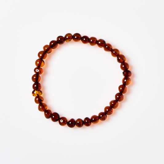 polished cognac Baltic amber beaded bracelet in an adult size