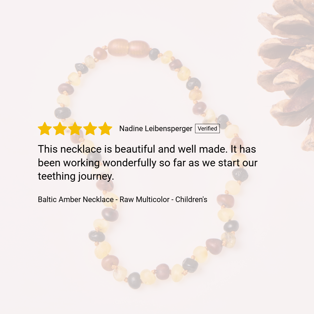 Raw baltic amber necklace with a five-star review on a light background